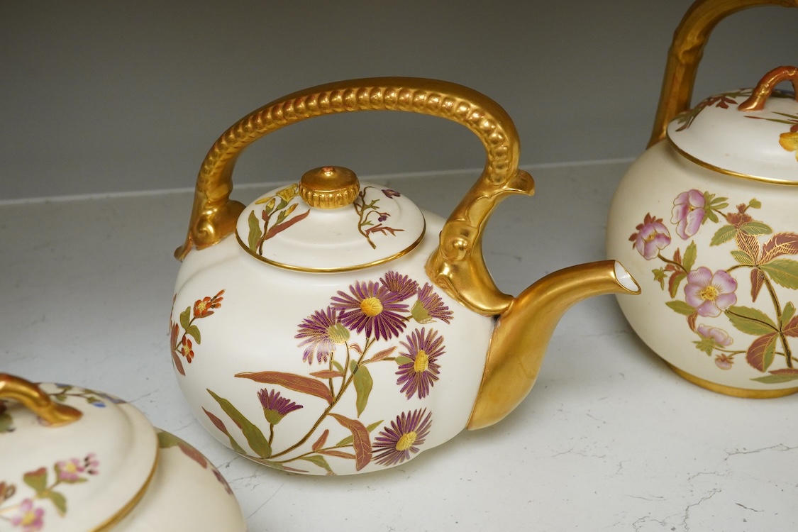 Four 19th century Worcester blush ivory teapots, with floral decoration and decorative handles, largest 20cm wide